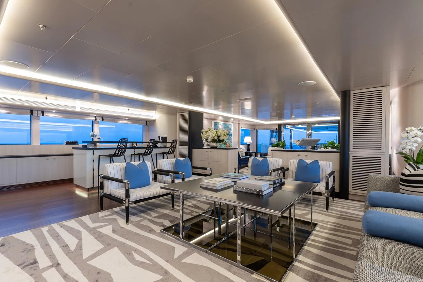 The salon features a spacious and modern design with comfortable seating and elegant decor. aboard ETERNITY Yacht for Sale