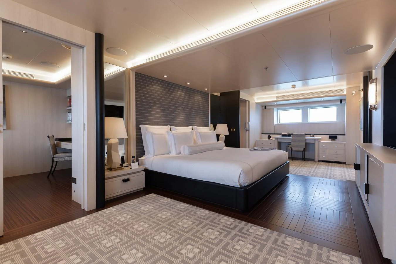 The master stateroom features a spacious layout with elegant furnishings and ample natural light. aboard ETERNITY Yacht for Sale