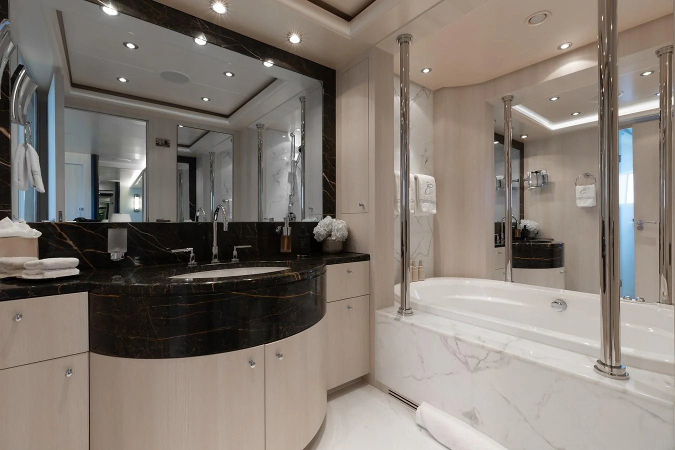 The yacht's bathroom features luxurious marble finishes and modern fixtures. aboard ETERNITY Yacht for Sale