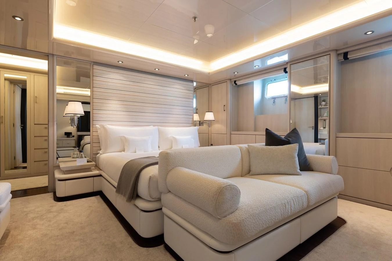 The master stateroom exudes luxury with its plush bedding and elegant furnishings. aboard ETERNITY Yacht for Sale