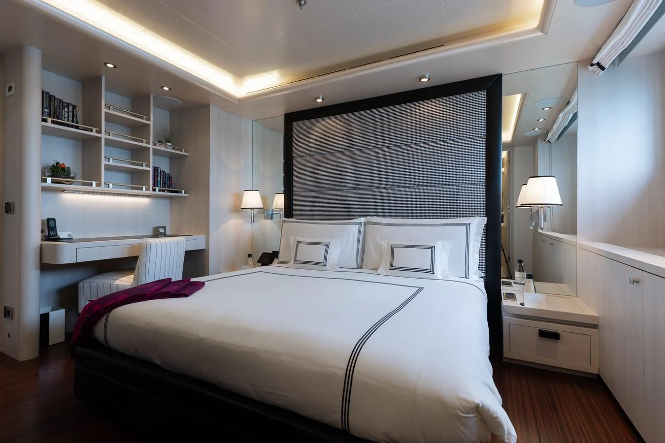 The master stateroom features a luxurious bed, elegant decor, and ample storage space. aboard ETERNITY Yacht for Sale