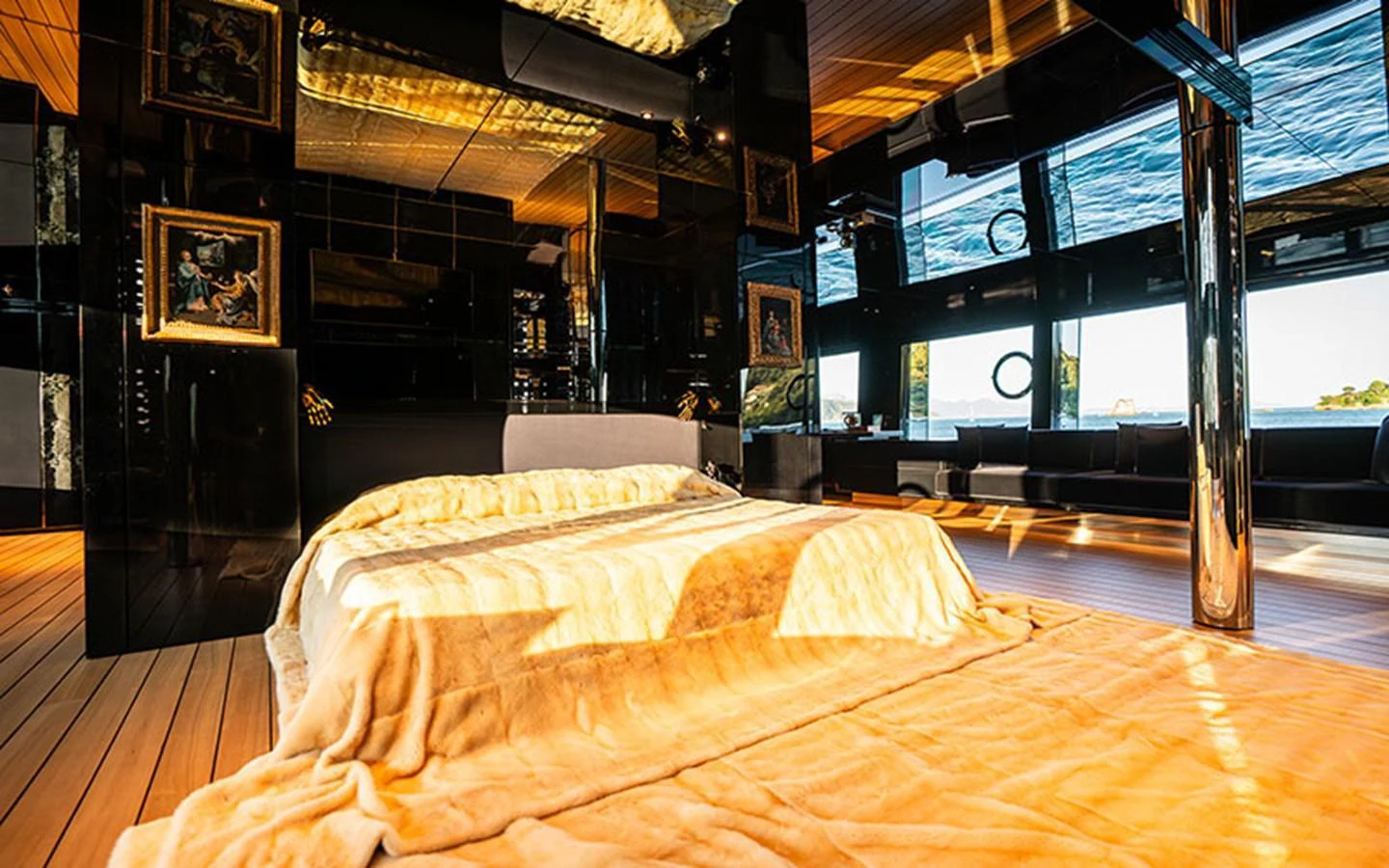 The master stateroom features luxurious bedding and expansive windows offering stunning views. aboard REGINA D'ITALIA Yacht for Sale