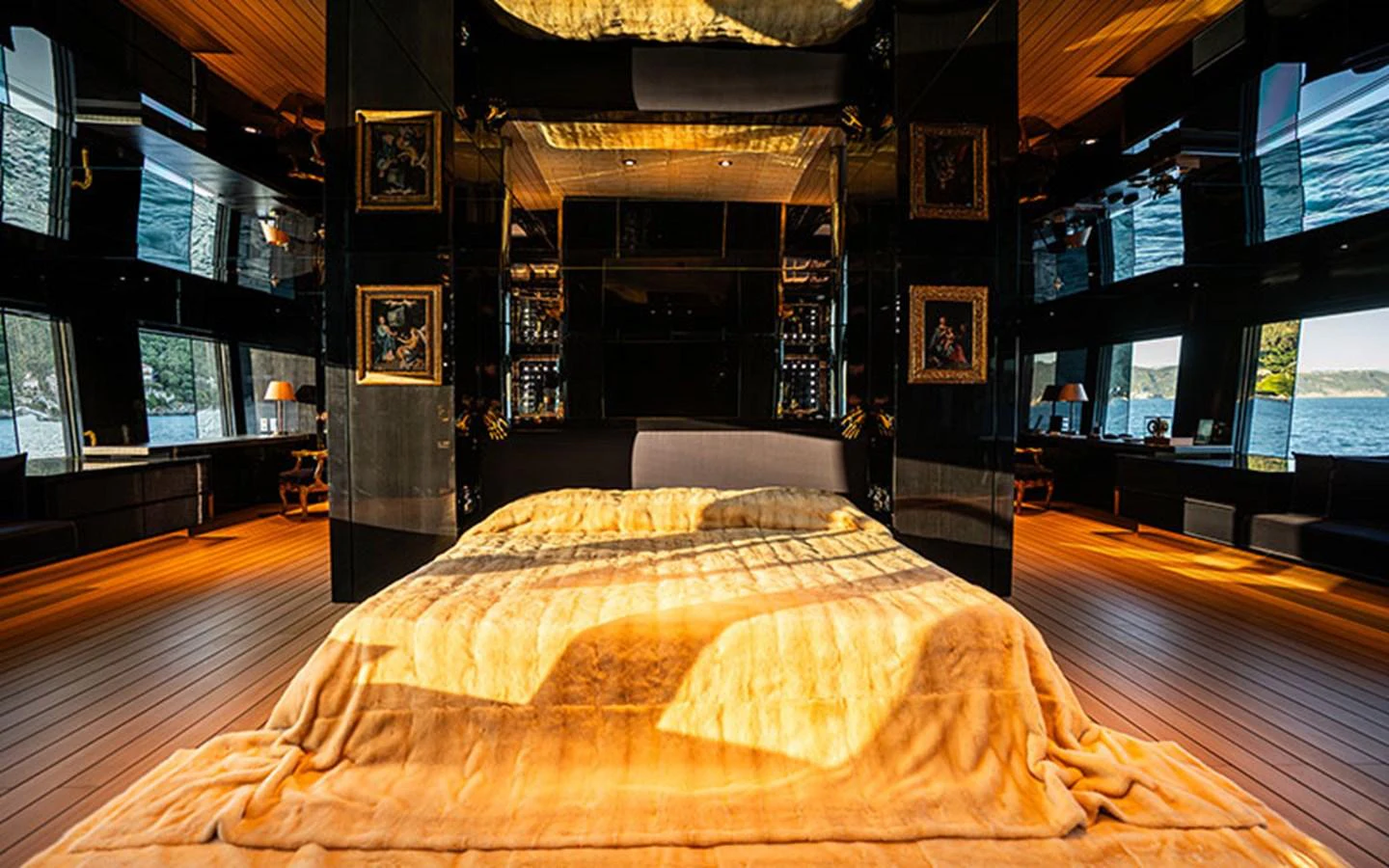 The master stateroom features luxurious bedding and expansive windows offering stunning views. aboard REGINA D'ITALIA Yacht for Sale