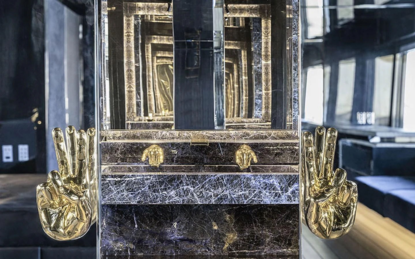 The interior features a luxurious and artistic design with gold accents and reflective surfaces. aboard REGINA D'ITALIA Yacht for Sale
