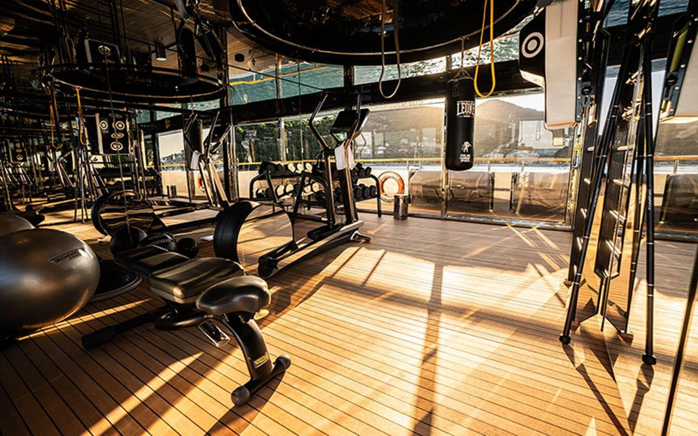 The yacht features a well-equipped gym with modern fitness equipment and ample natural light. aboard REGINA D'ITALIA Yacht for Sale