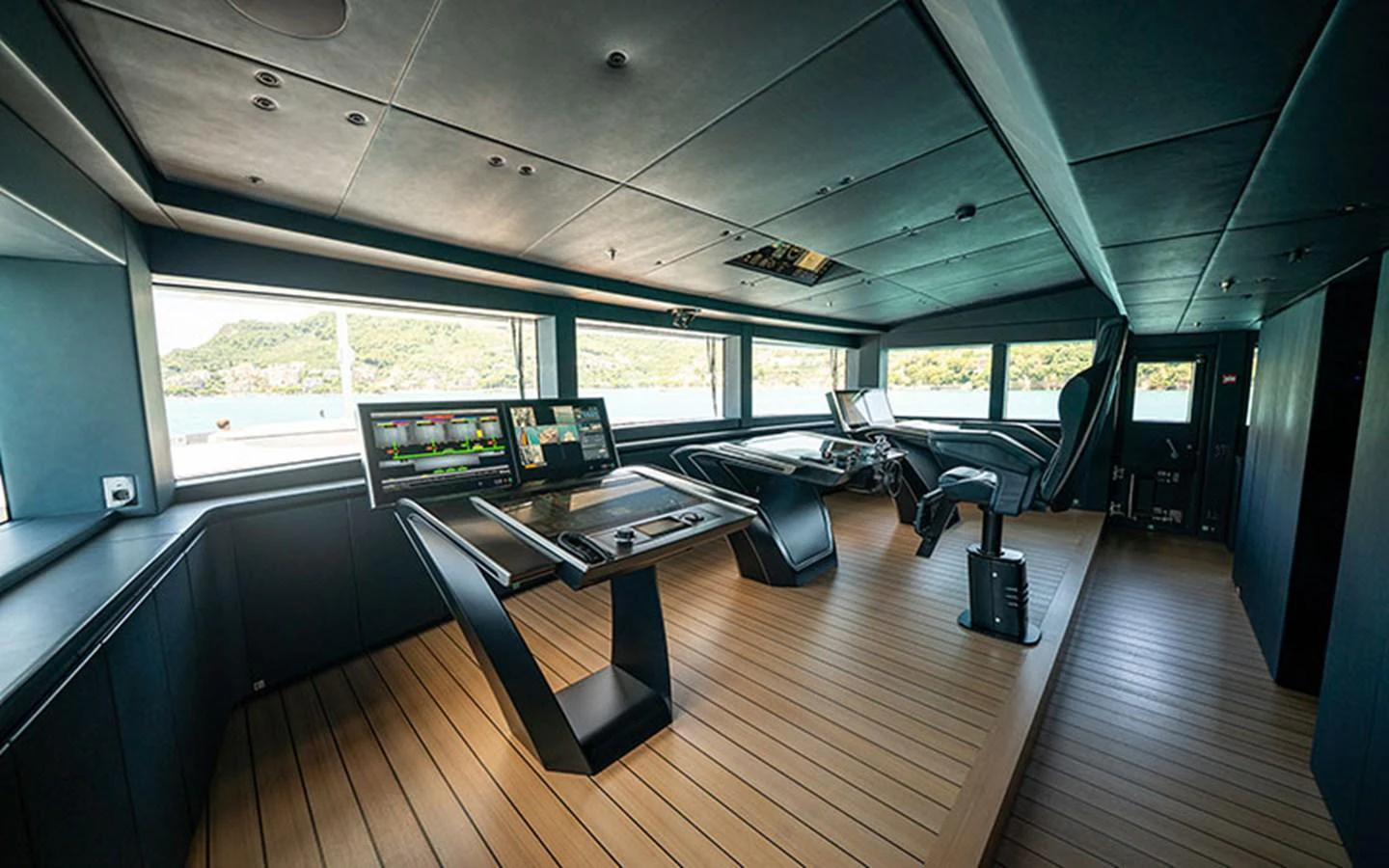 The helm station features state-of-the-art navigation equipment and panoramic views. aboard REGINA D'ITALIA Yacht for Sale