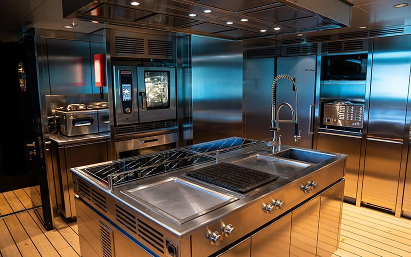 The yacht's galley is equipped with modern stainless steel appliances and ample counter space. aboard REGINA D'ITALIA Yacht for Sale