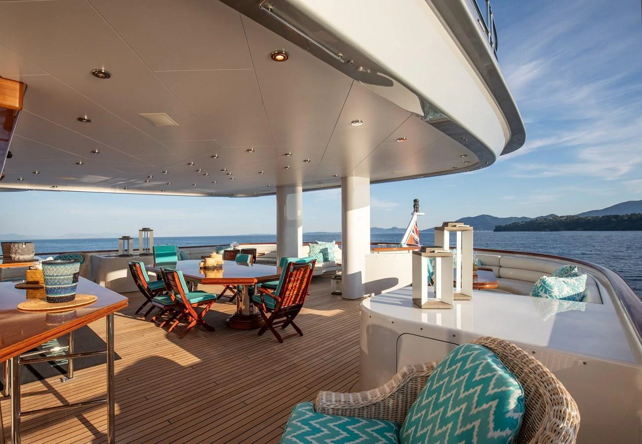 The aft deck offers a spacious and inviting area for relaxation and dining with stunning ocean views. aboard LADY MARINA Yacht for Sale