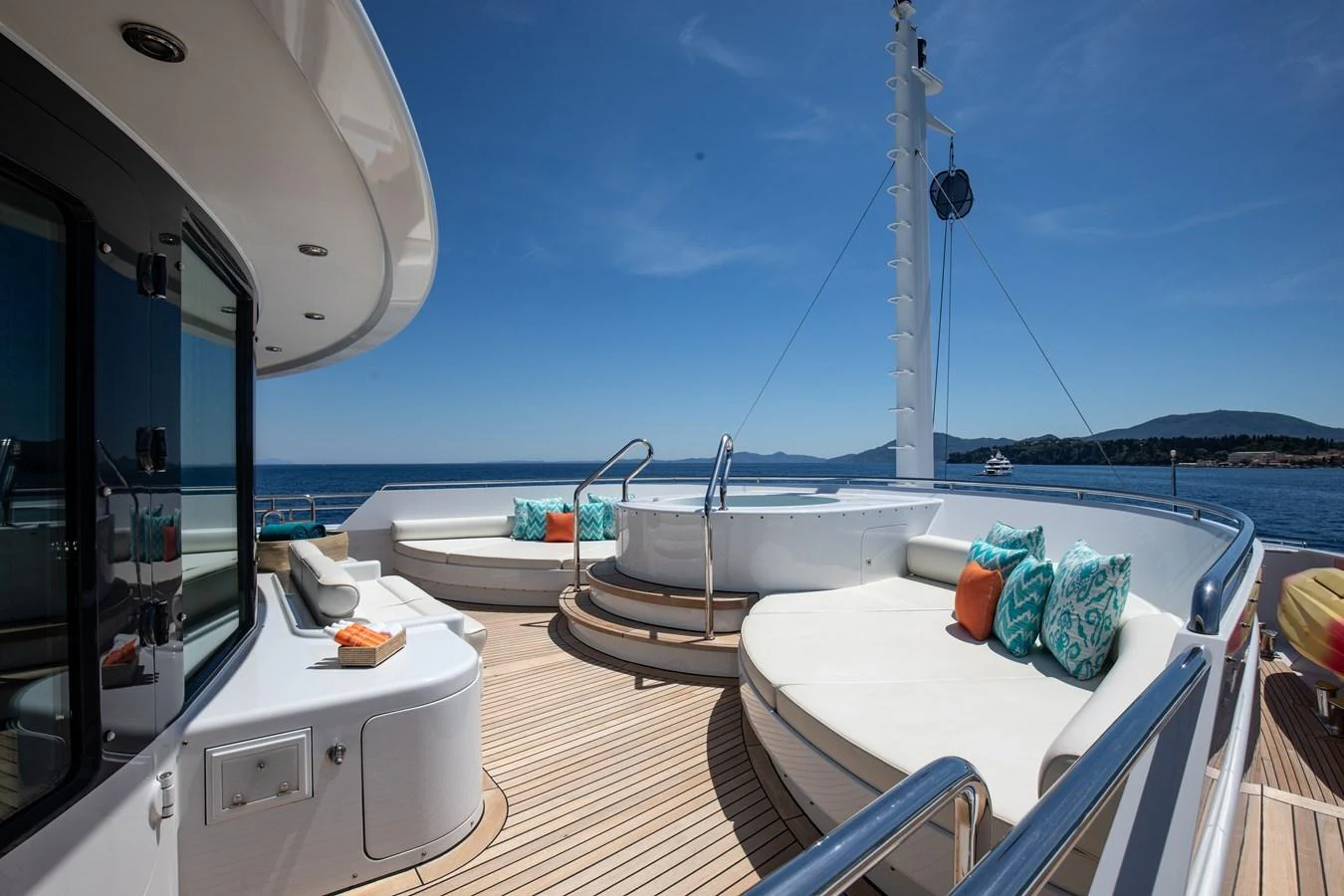 The sundeck offers luxurious lounging areas with plush seating and a jacuzzi, perfect for relaxation under the sun. aboard LADY MARINA Yacht for Sale