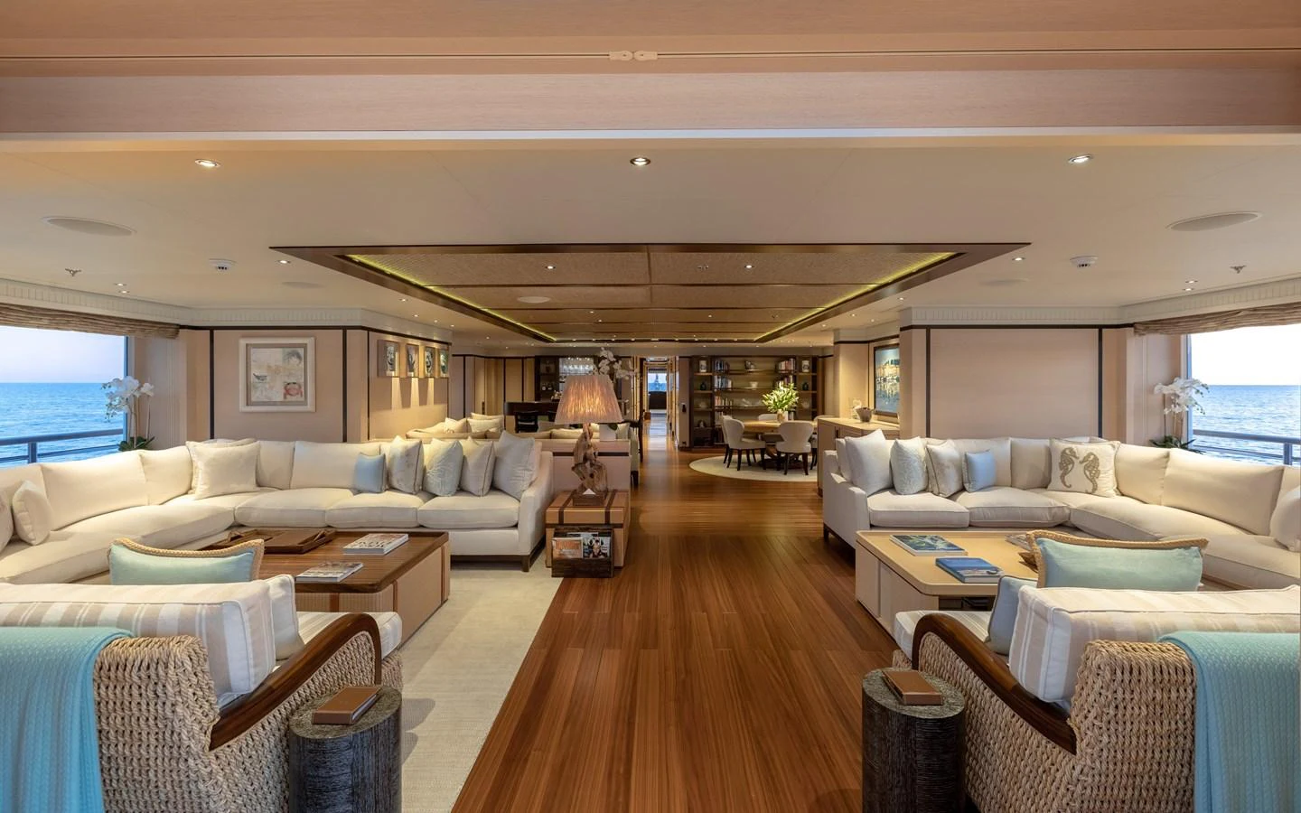 The spacious salon features elegant seating areas with panoramic ocean views. aboard BATON ROUGE Yacht for Sale