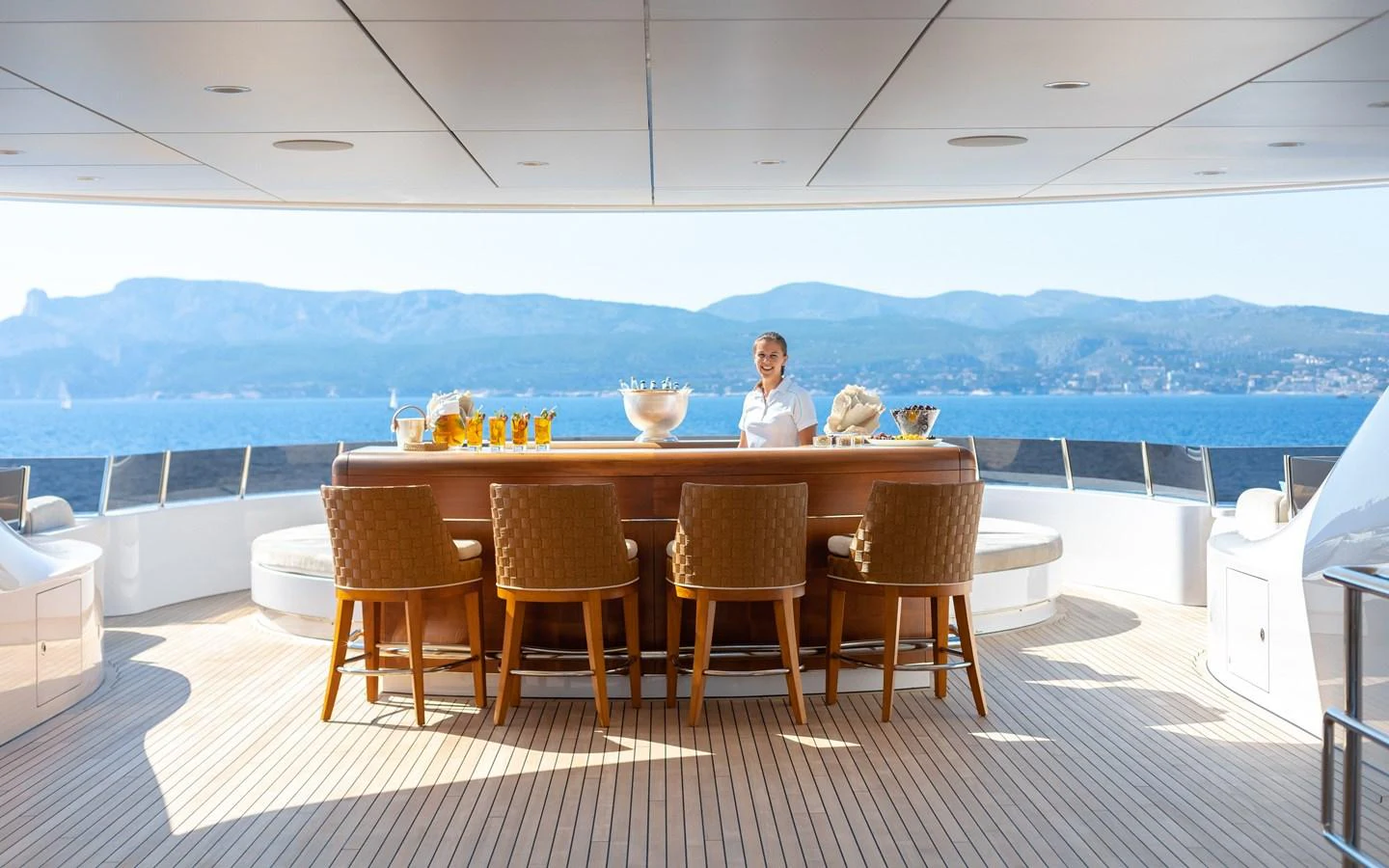 The yacht features a stylish outdoor bar with a stunning sea view, perfect for relaxation and socializing. aboard BATON ROUGE Yacht for Sale
