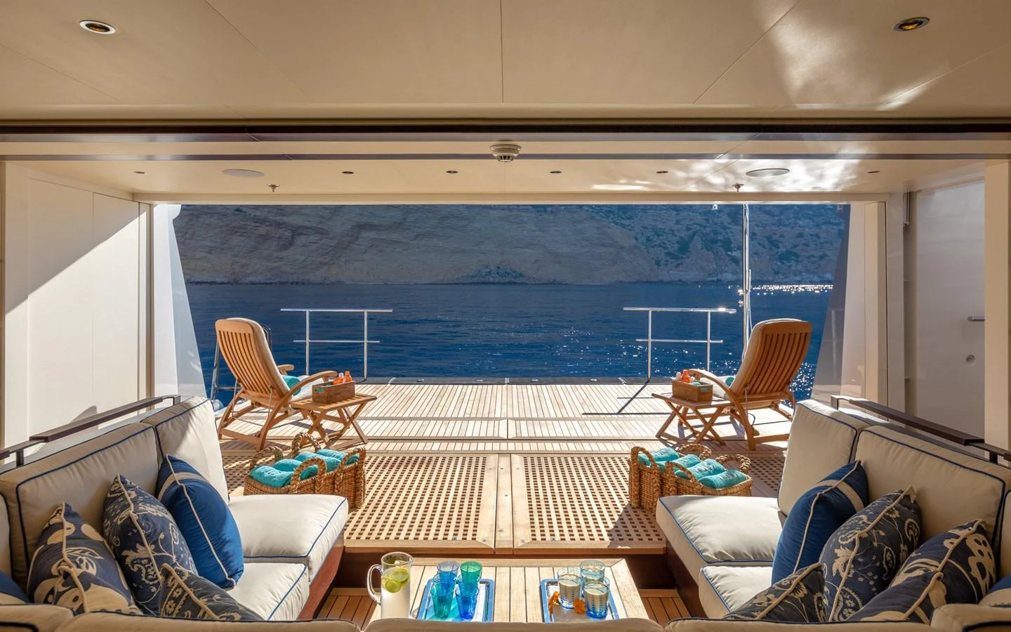 The aft deck offers a luxurious and inviting space with comfortable seating and stunning ocean views. aboard BATON ROUGE Yacht for Sale