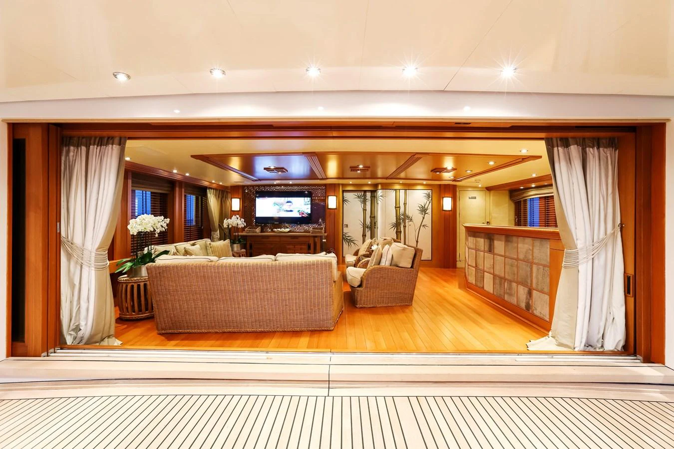 The salon offers a spacious and inviting area with comfortable seating and elegant decor. aboard ESMERALDA Yacht for Sale