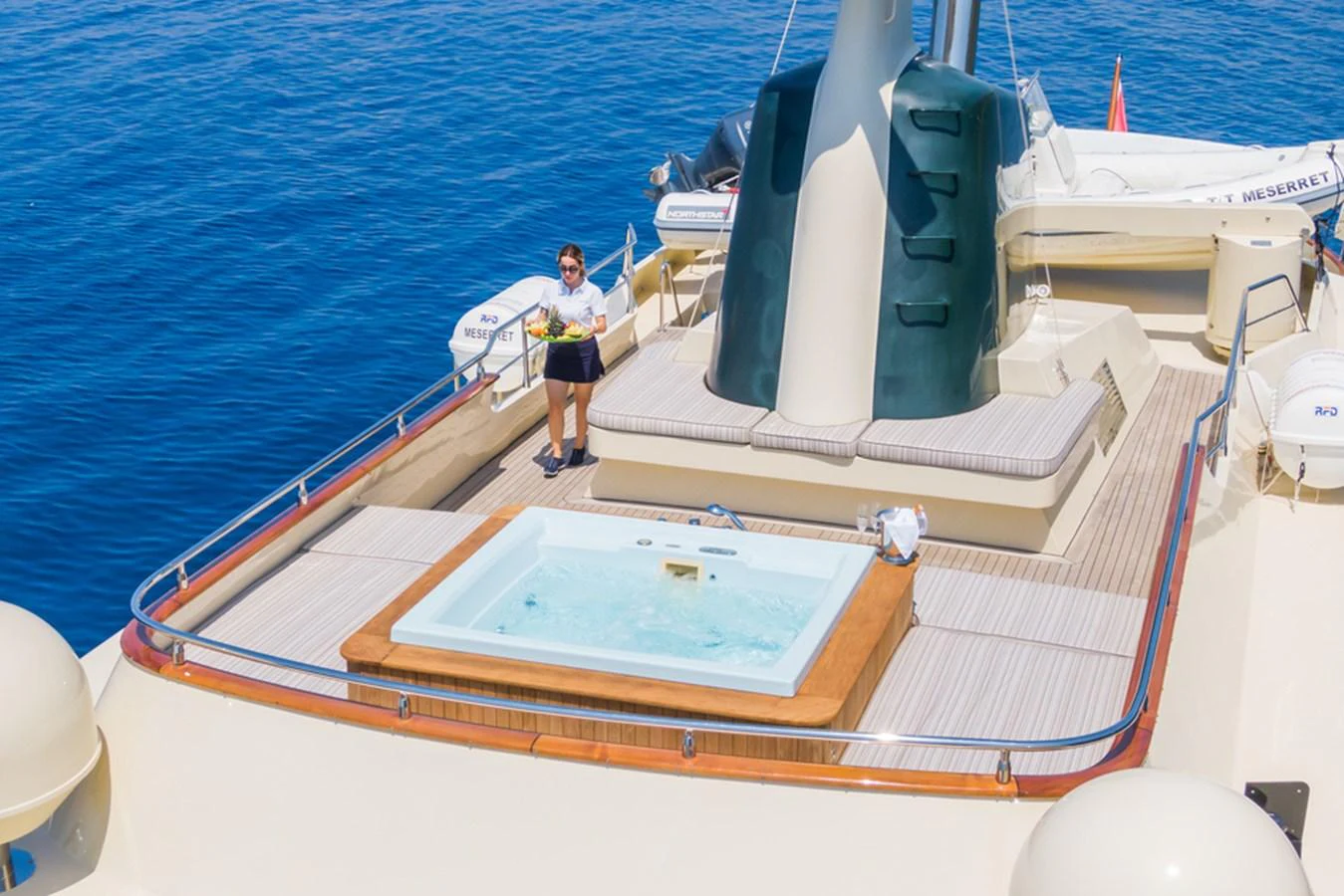 The sundeck features a luxurious jacuzzi with ample lounging space, perfect for relaxation. aboard MESERRET Yacht for Sale