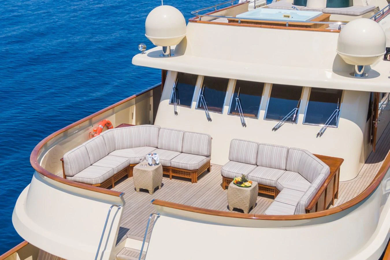 The sundeck offers a spacious and inviting seating area with panoramic ocean views. aboard MESERRET Yacht for Sale