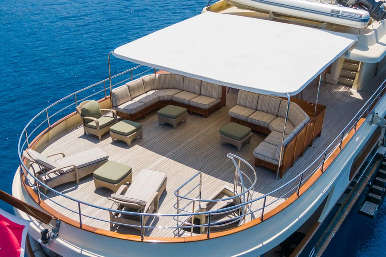 The sundeck offers a spacious and inviting area with ample seating and shade for relaxation. aboard MESERRET Yacht for Sale