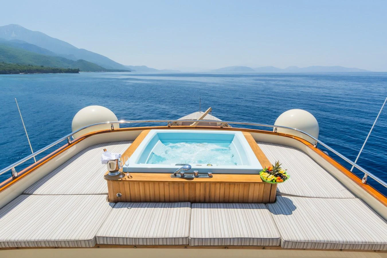 The sundeck features a luxurious jacuzzi with stunning ocean views. aboard MESERRET Yacht for Sale