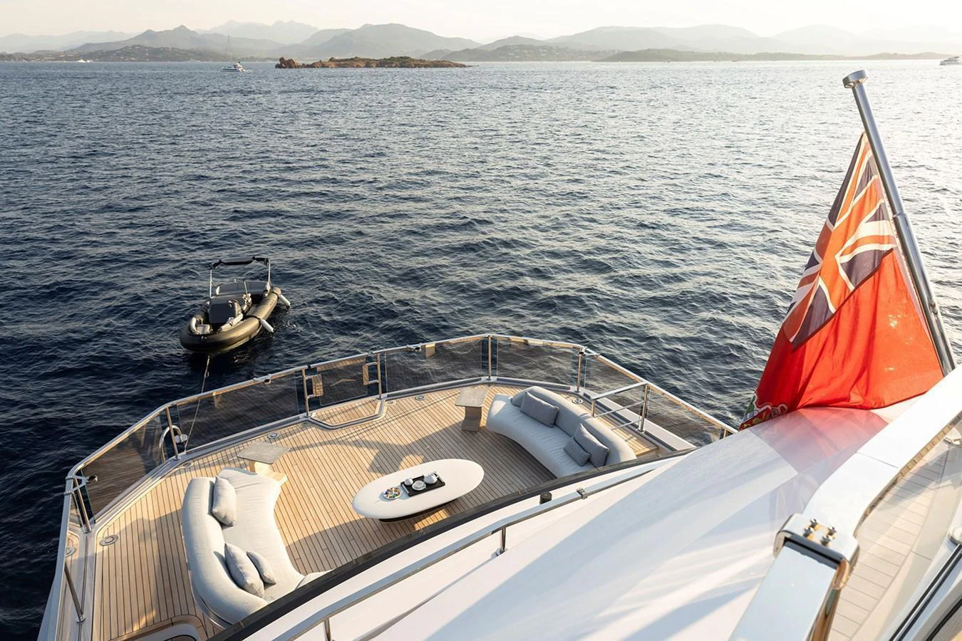 The yacht's aft deck offers a spacious and inviting area with comfortable seating and stunning views of the surrounding waters. aboard TAMANYA Yacht for Sale