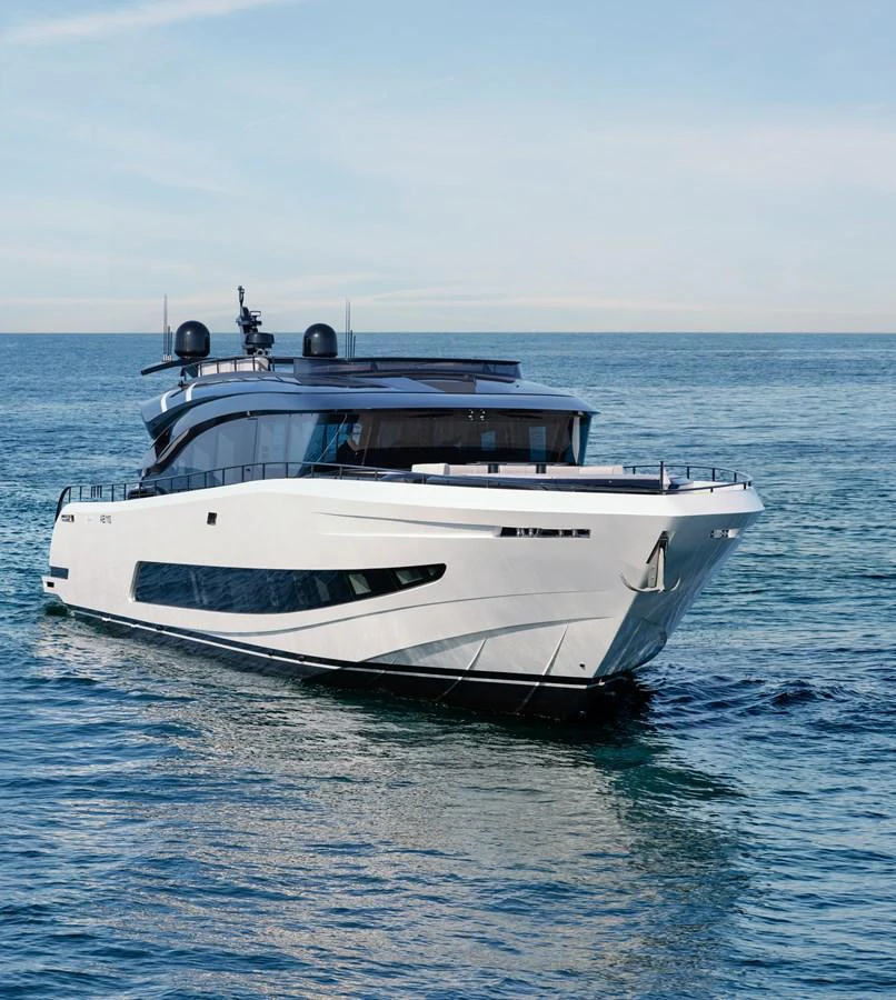 A sleek and modern yacht cruising on calm waters under a clear sky. aboard AB 110 Yacht for Sale