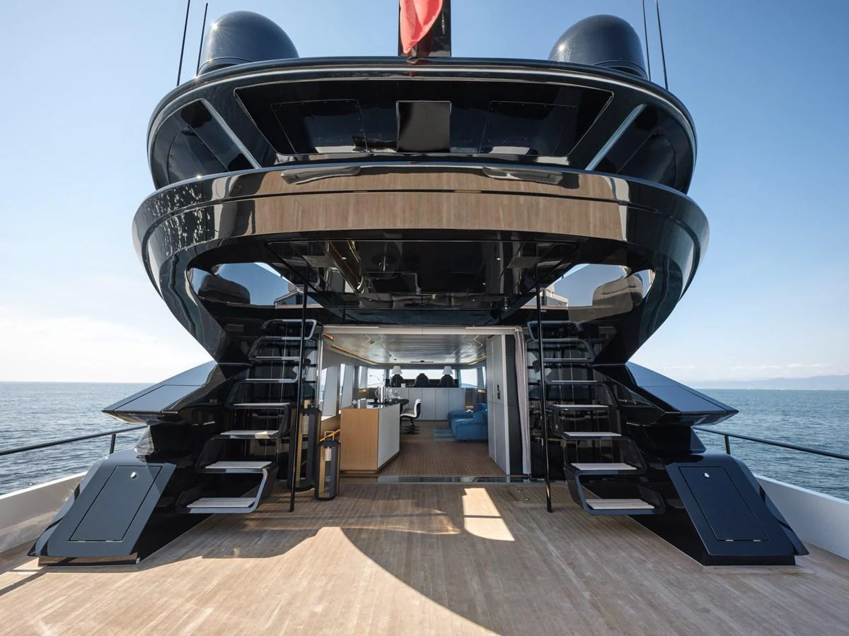 The yacht's aft deck features a sleek, modern design with ample space for relaxation and entertainment. aboard AB 110 Yacht for Sale