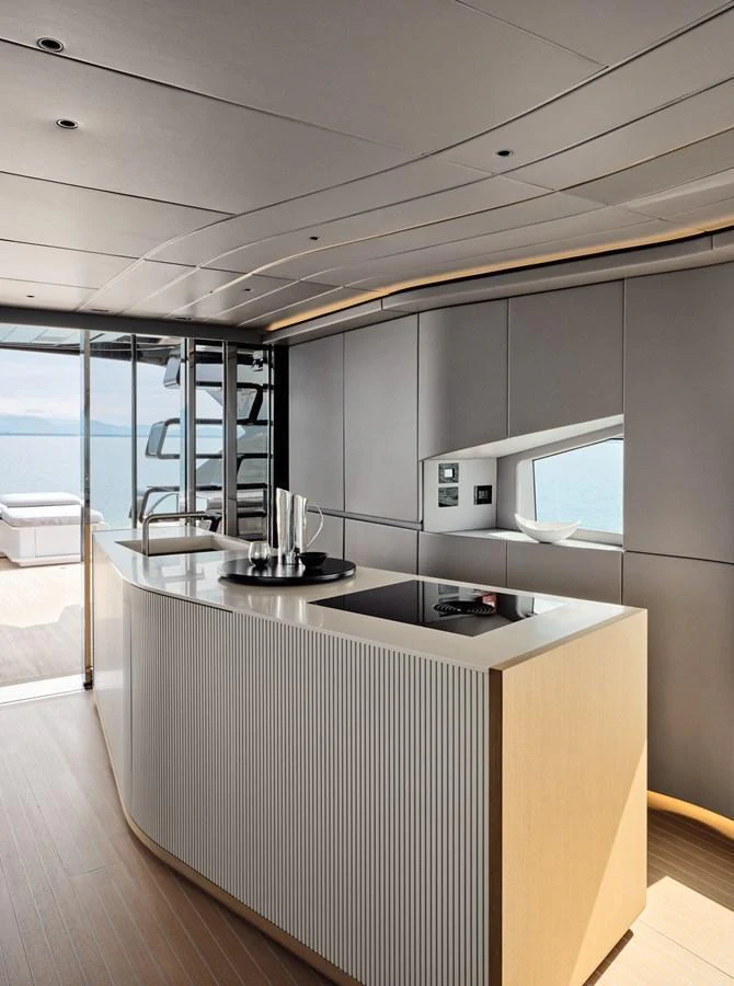 The sleek and modern galley offers a stylish and functional space for onboard dining and entertaining. aboard AB 110 Yacht for Sale