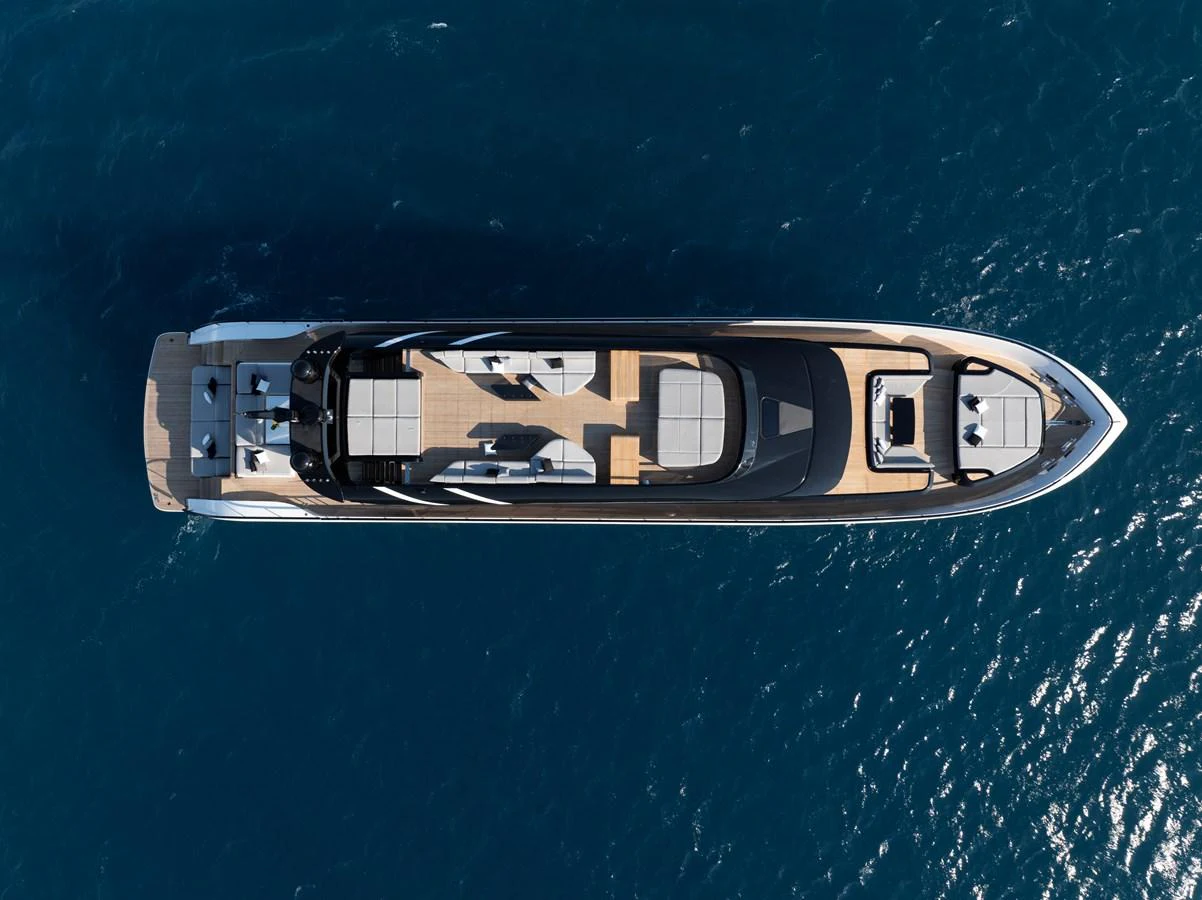 A sleek and modern yacht is captured from an aerial perspective, showcasing its elegant design and spacious deck areas. aboard AB 110 Yacht for Sale