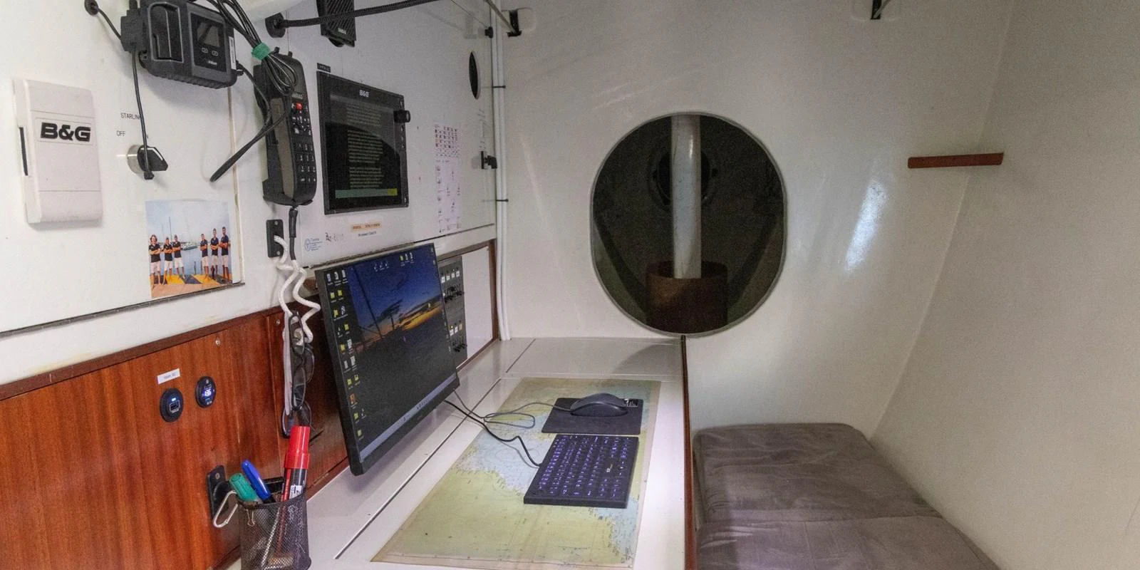The yacht's navigation station is equipped with advanced electronics and a comfortable workspace. aboard MAXICAT VICTORIA Yacht for Sale