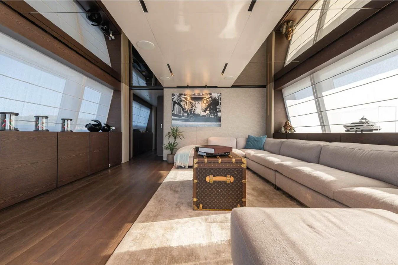The salon features a spacious and luxurious seating area with modern decor and ample natural light. aboard ON Yacht for Sale