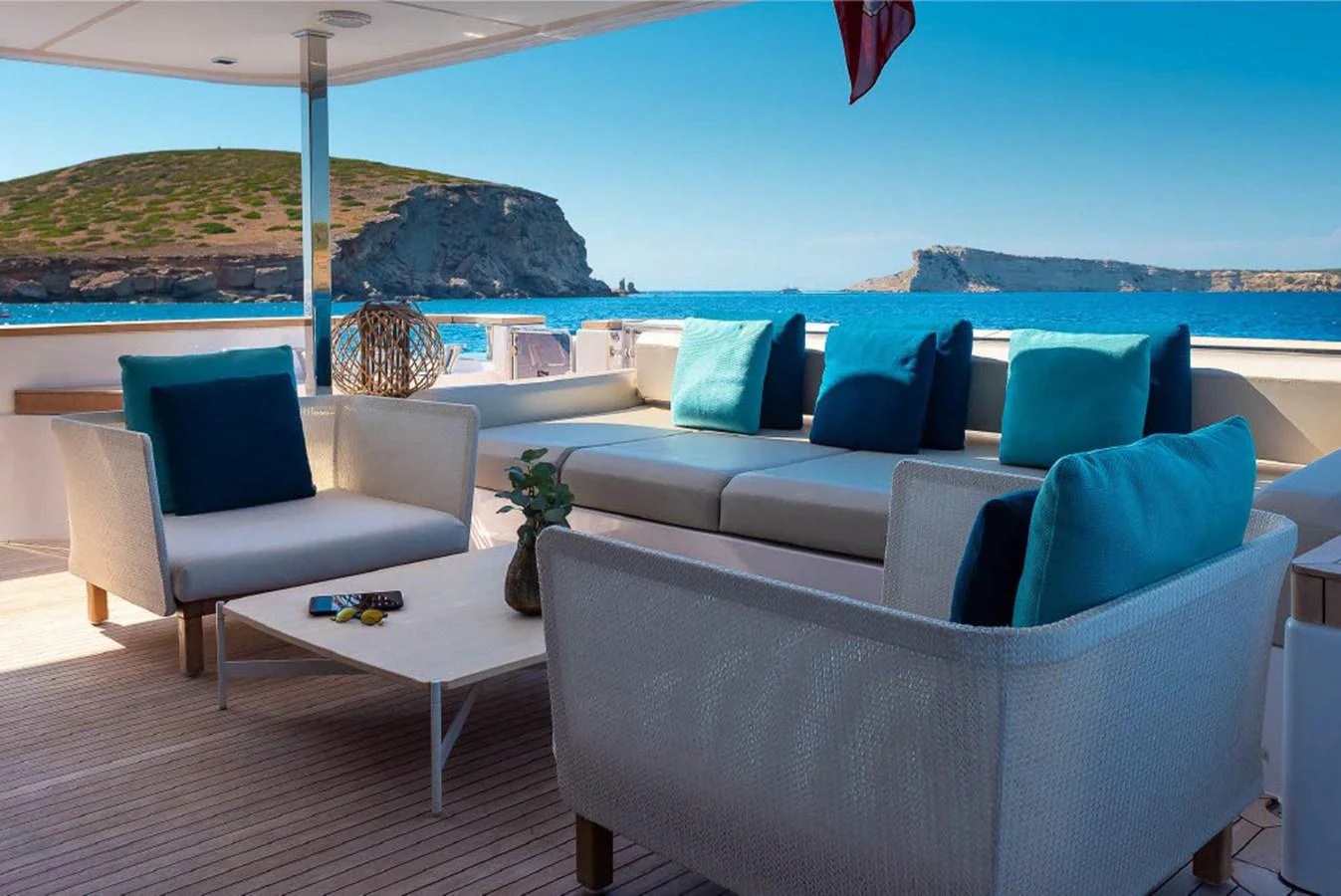 The aft deck features comfortable seating with a stunning view of the surrounding seascape. aboard ON Yacht for Sale