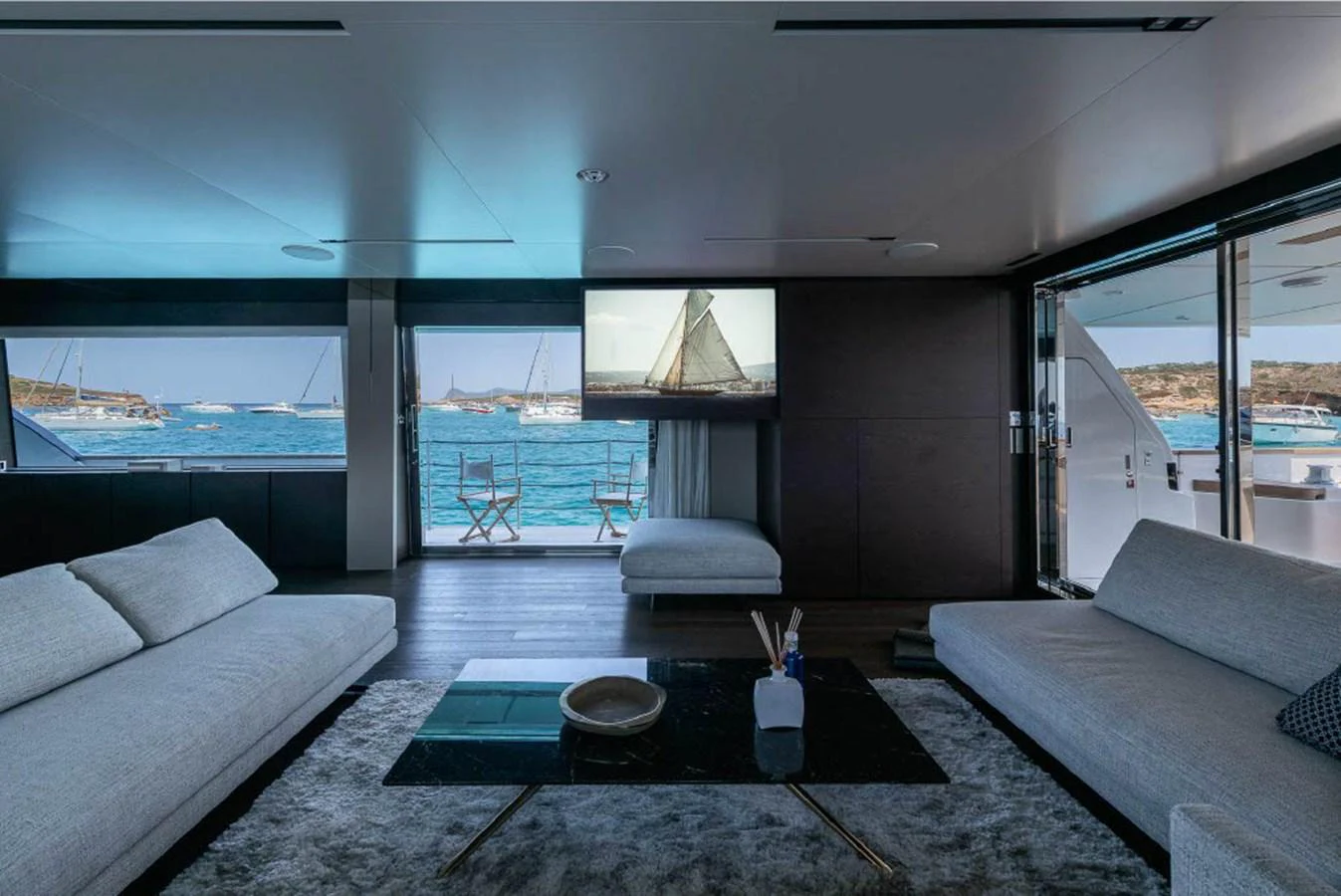 The salon offers a luxurious and spacious area with panoramic views of the sea. aboard ON Yacht for Sale