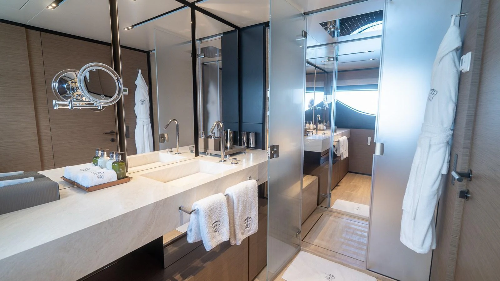 The yacht's bathroom features modern fixtures and a luxurious design. aboard QUEEN J III Yacht for Sale
