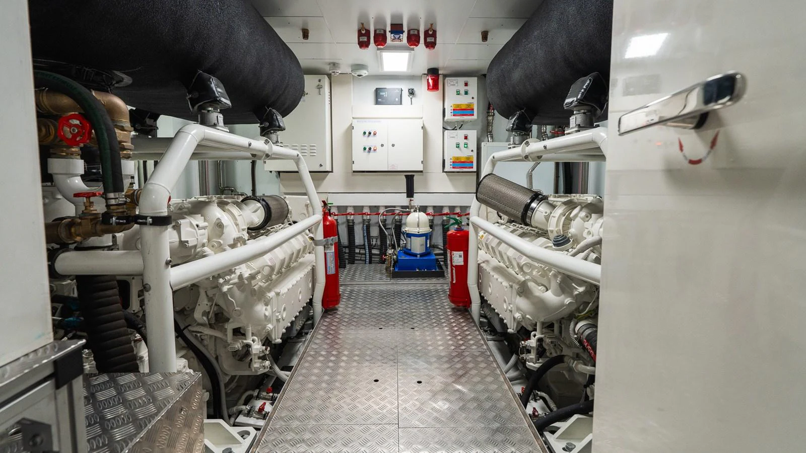 The engine room showcases the yacht's powerful and well-maintained machinery. aboard QUEEN J III Yacht for Sale