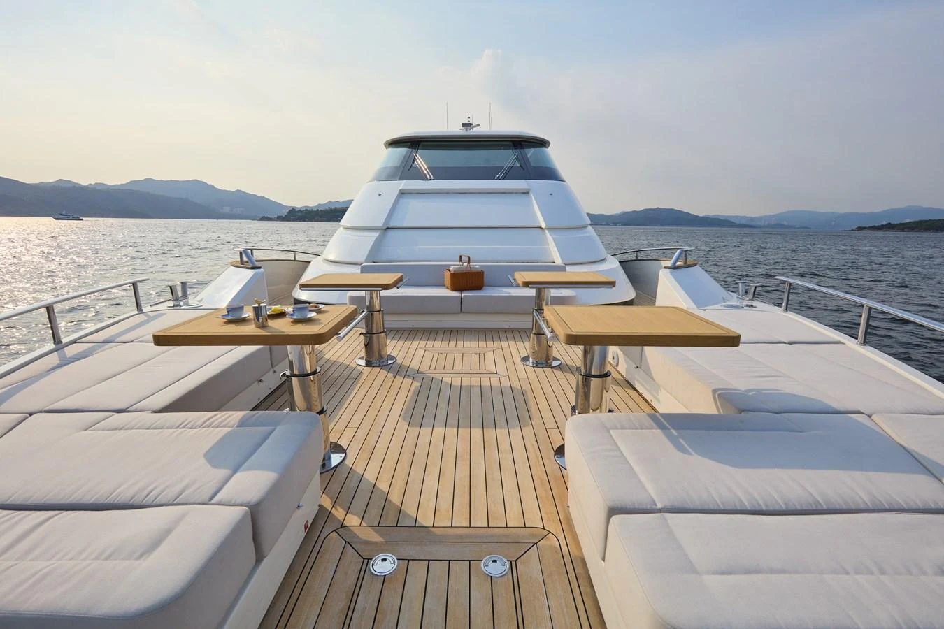 The spacious foredeck offers luxurious seating and dining areas with stunning views. aboard MIRAE Yacht for Sale