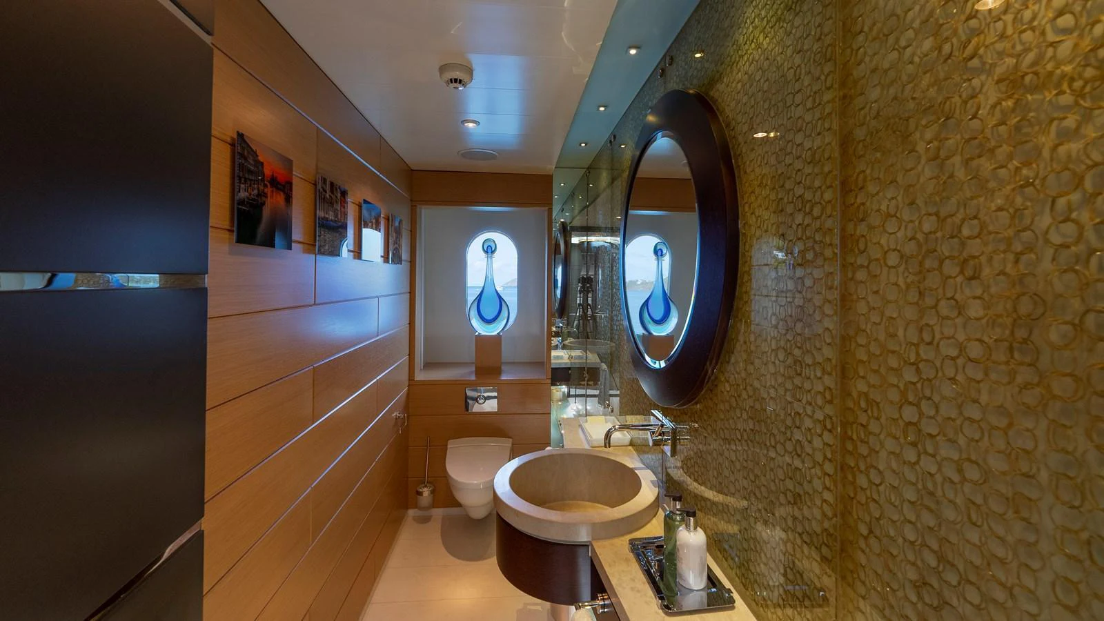 A luxurious yacht bathroom featuring modern fixtures and elegant decor. aboard SCOTT FREE Yacht for Sale