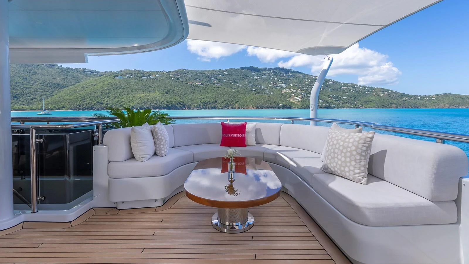 The aft deck features a spacious and elegant seating area with stunning views of the surrounding waters. aboard SCOTT FREE Yacht for Sale