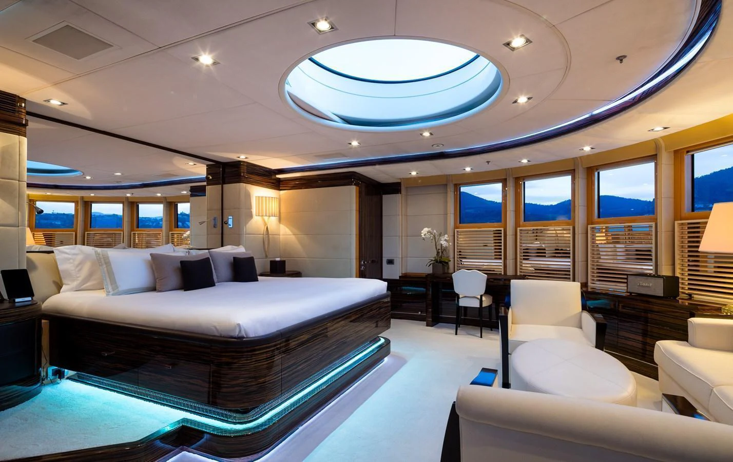 The master stateroom features luxurious furnishings and a large skylight for natural light. aboard VISION Yacht for Sale