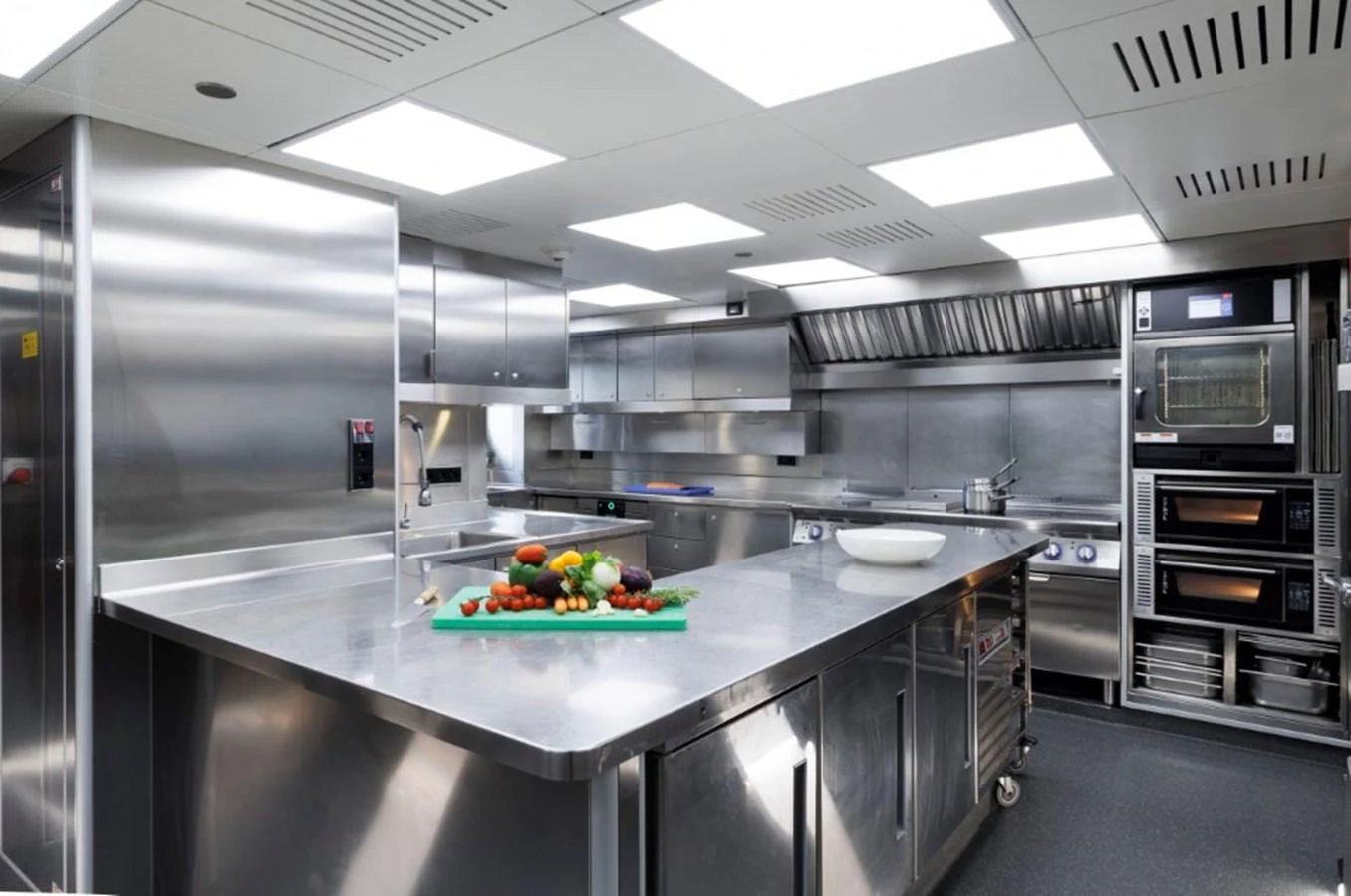 The yacht's galley is equipped with modern stainless steel appliances and ample counter space for gourmet meal preparation. aboard IDOL Yacht for Sale