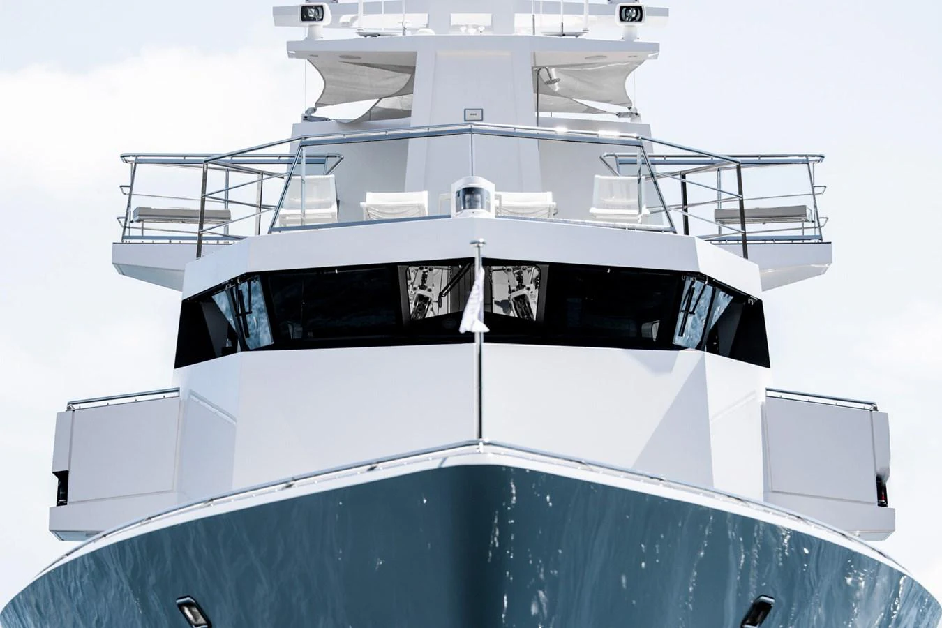 A sleek and modern yacht is captured head-on, showcasing its impressive design and structure. aboard RONIN Yacht for Sale