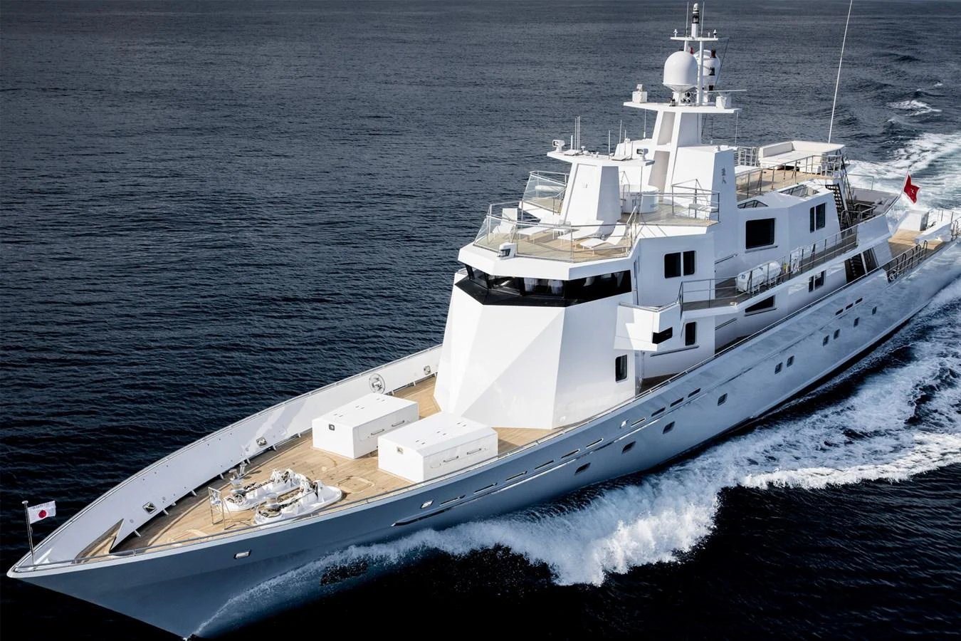 A sleek and modern yacht cruising through calm waters. aboard RONIN Yacht for Sale