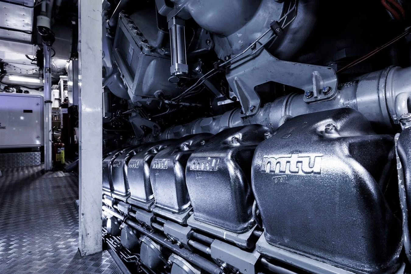 The image showcases the powerful and meticulously maintained engine room of the yacht. aboard RONIN Yacht for Sale