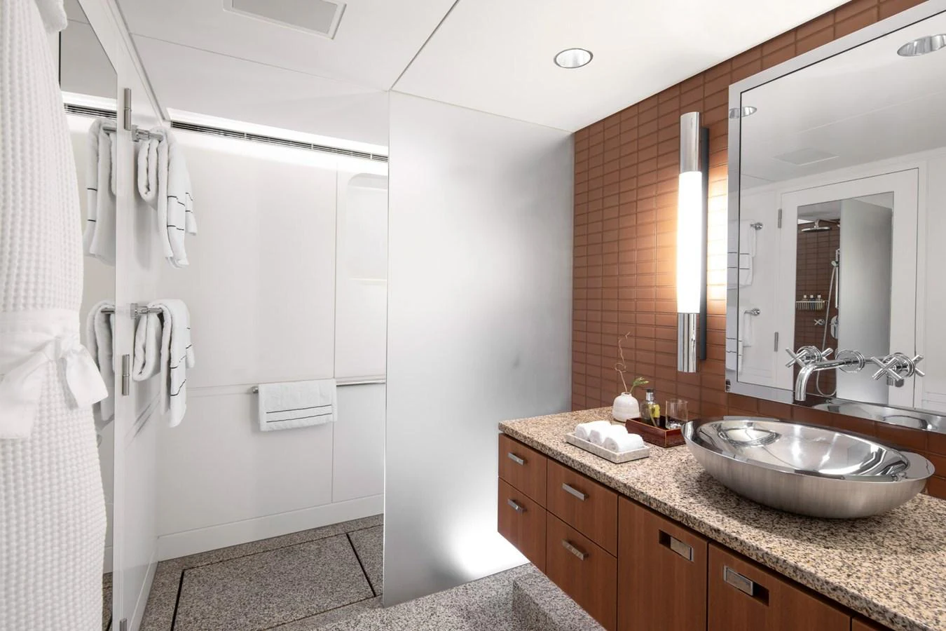 A luxurious yacht bathroom featuring modern fixtures and elegant design. aboard RONIN Yacht for Sale