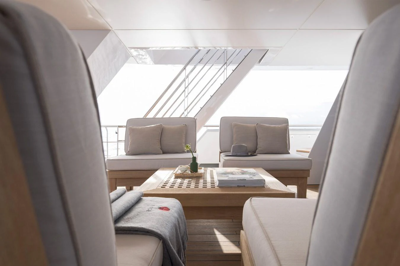 The salon offers a serene and inviting space with plush seating and soft natural light. aboard RONIN Yacht for Sale
