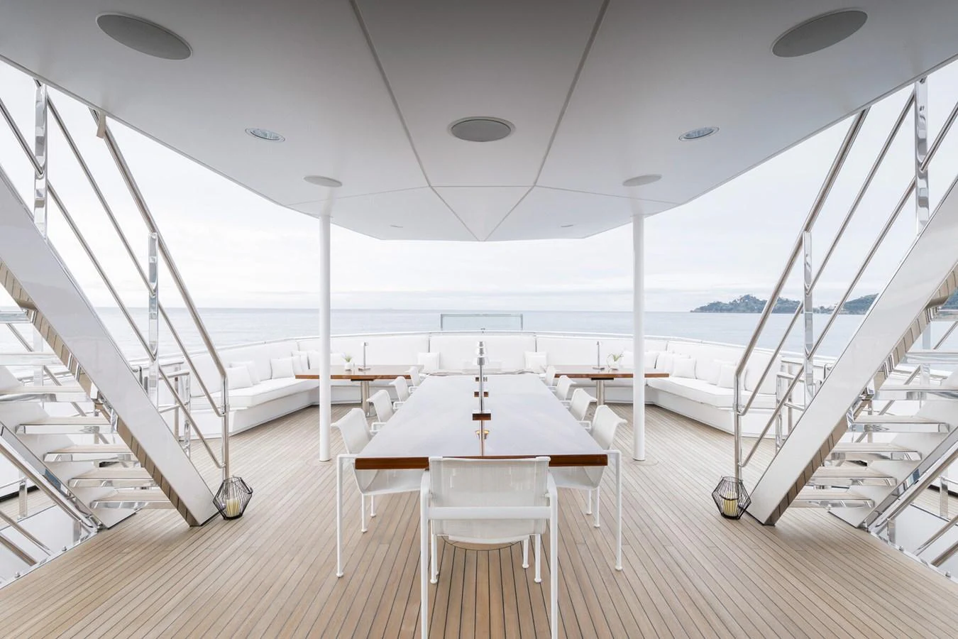 The aft deck features a spacious and elegant dining area with panoramic ocean views. aboard RONIN Yacht for Sale