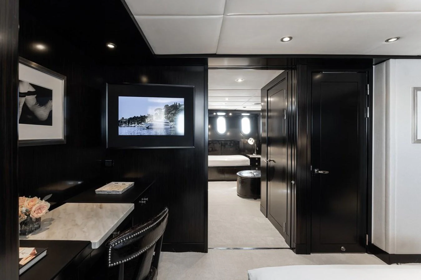 A luxurious stateroom with elegant furnishings and modern amenities. aboard CARPE DIEM Yacht for Sale
