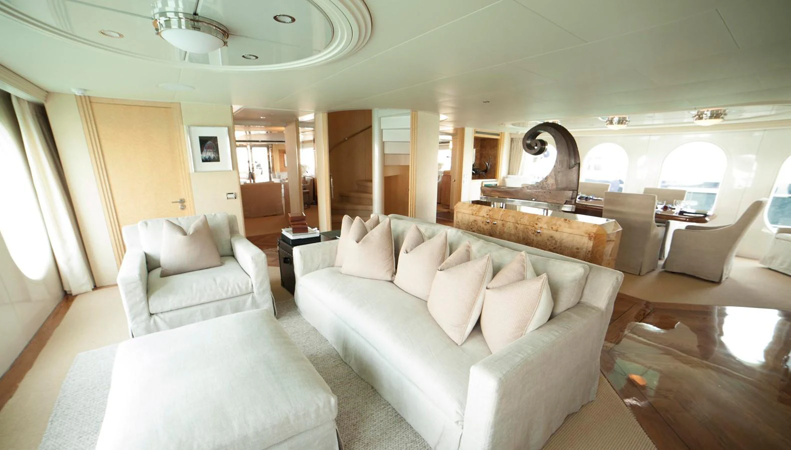 The spacious salon features plush seating and elegant decor, creating a luxurious and inviting atmosphere. aboard OCEANA I Yacht for Sale