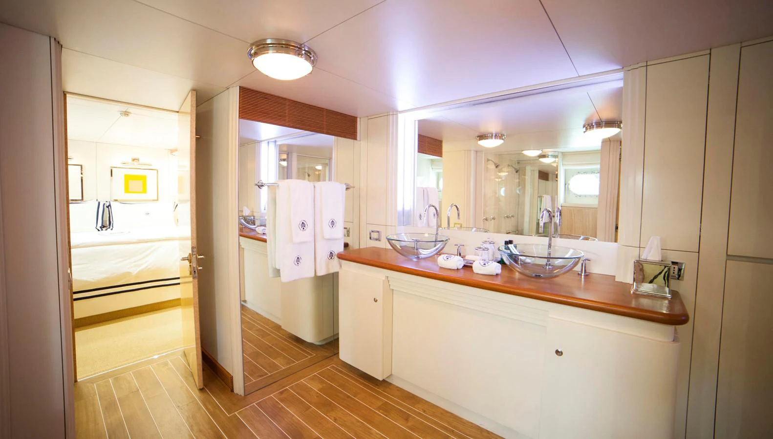 The yacht's bathroom features a spacious and elegant design with modern fixtures. aboard OCEANA I Yacht for Sale