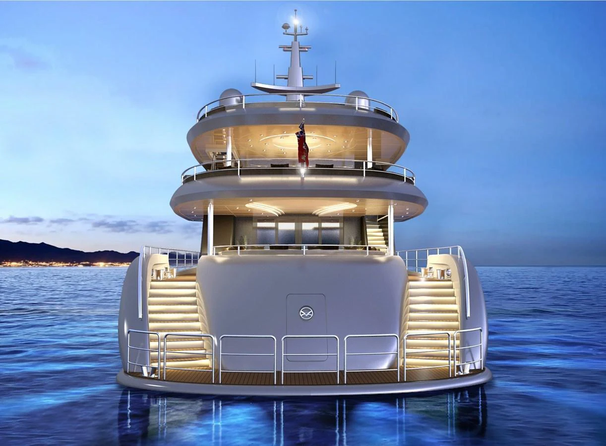 The yacht's illuminated stern showcases multiple decks and elegant staircases, creating a stunning evening ambiance on the water. aboard ROMEO 55 Yacht for Sale