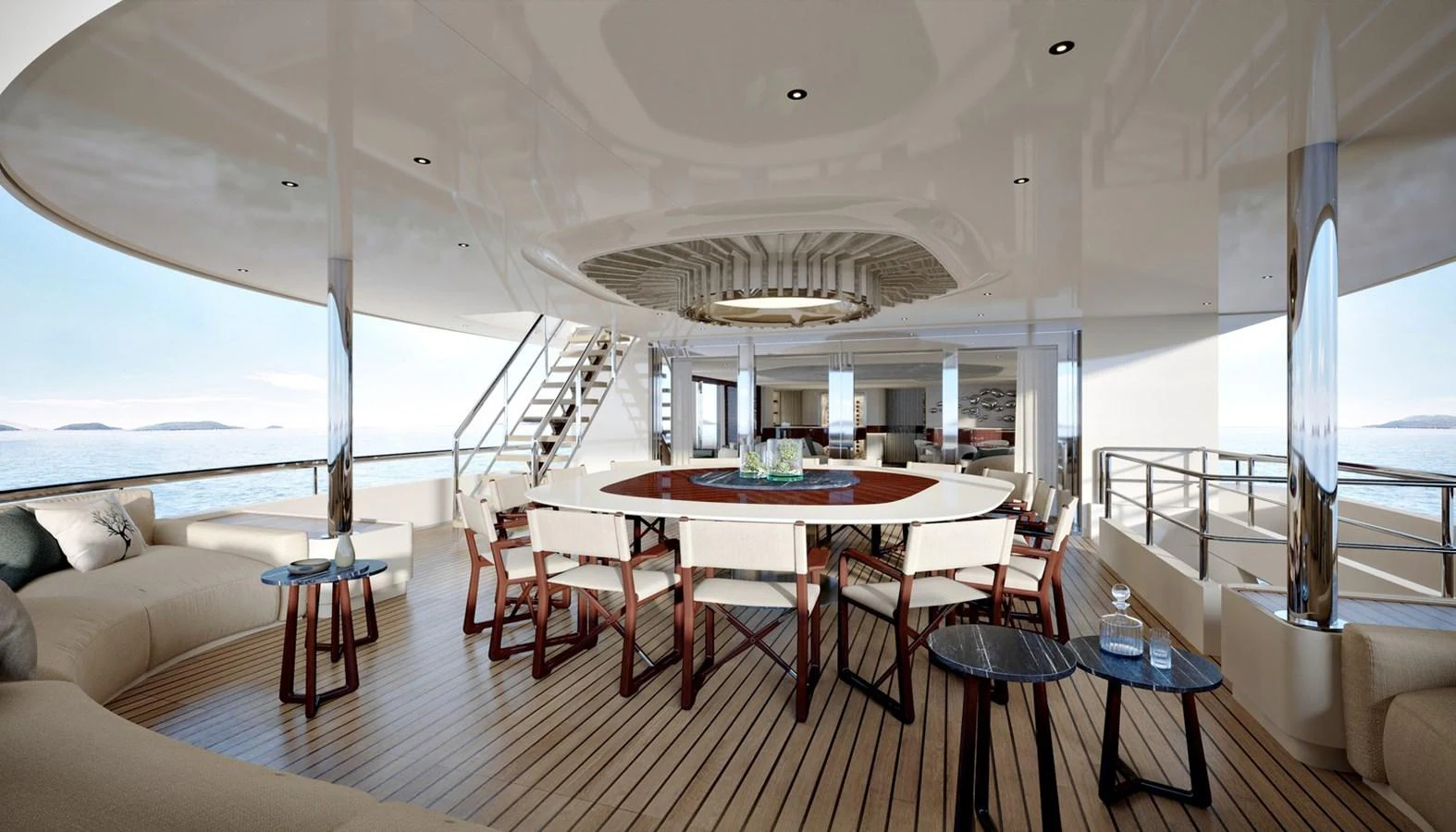 The aft deck features a spacious dining area with elegant seating and panoramic ocean views. aboard ROMEO 55 Yacht for Sale