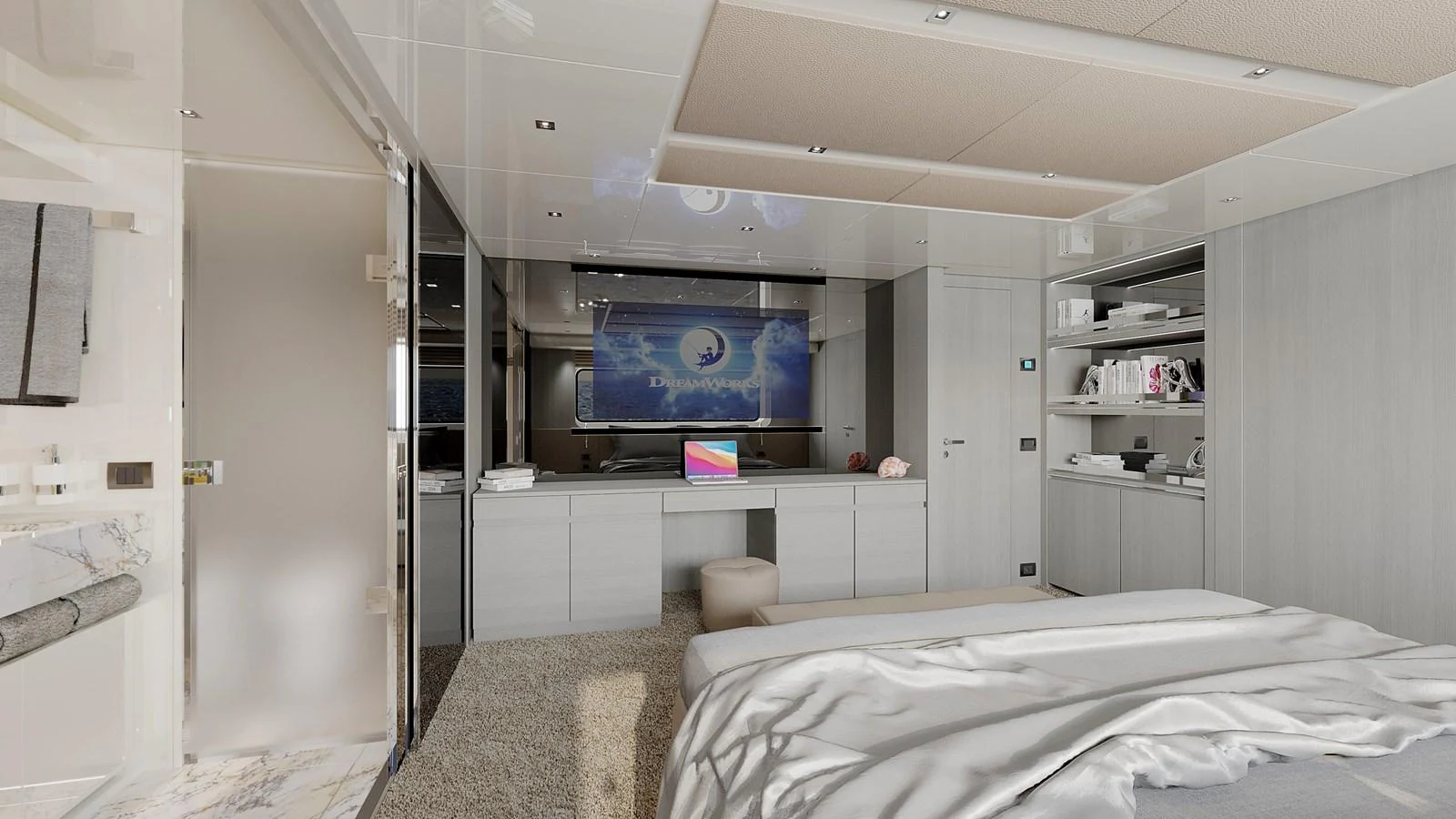 The master stateroom features a luxurious bed, ample storage, and a large screen for entertainment. aboard NOON Yacht for Sale