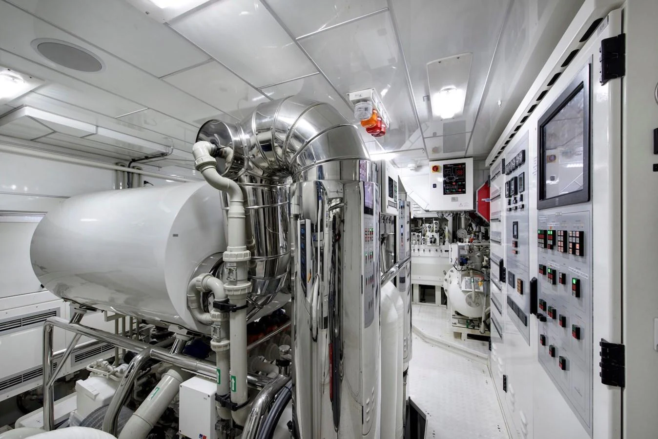 The engine room is equipped with advanced machinery and control panels, showcasing the yacht's technical prowess. aboard METEOR Yacht for Sale